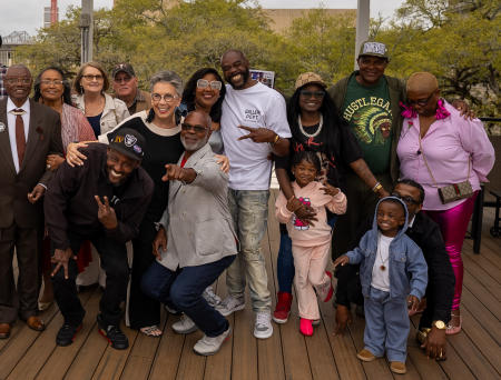 Larry Delmore and Earl Truvia stayed out of the photo when we added spouses so we had to lure them into the photo!