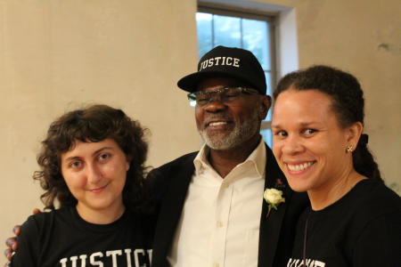 Kate and Erica, staff at IPNO, with Earl Truvia