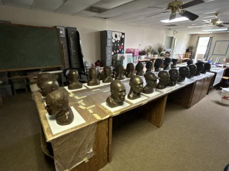 The original fired clay busts waiting to be reproduced