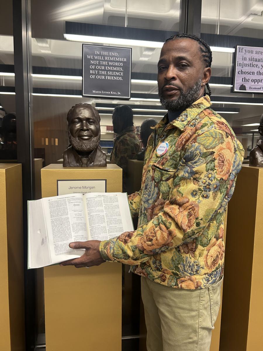 Jerome Morgan with a law book where he found his case.