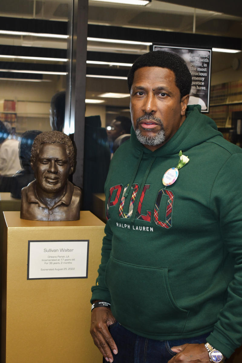Sullivan Walter with his portrait.