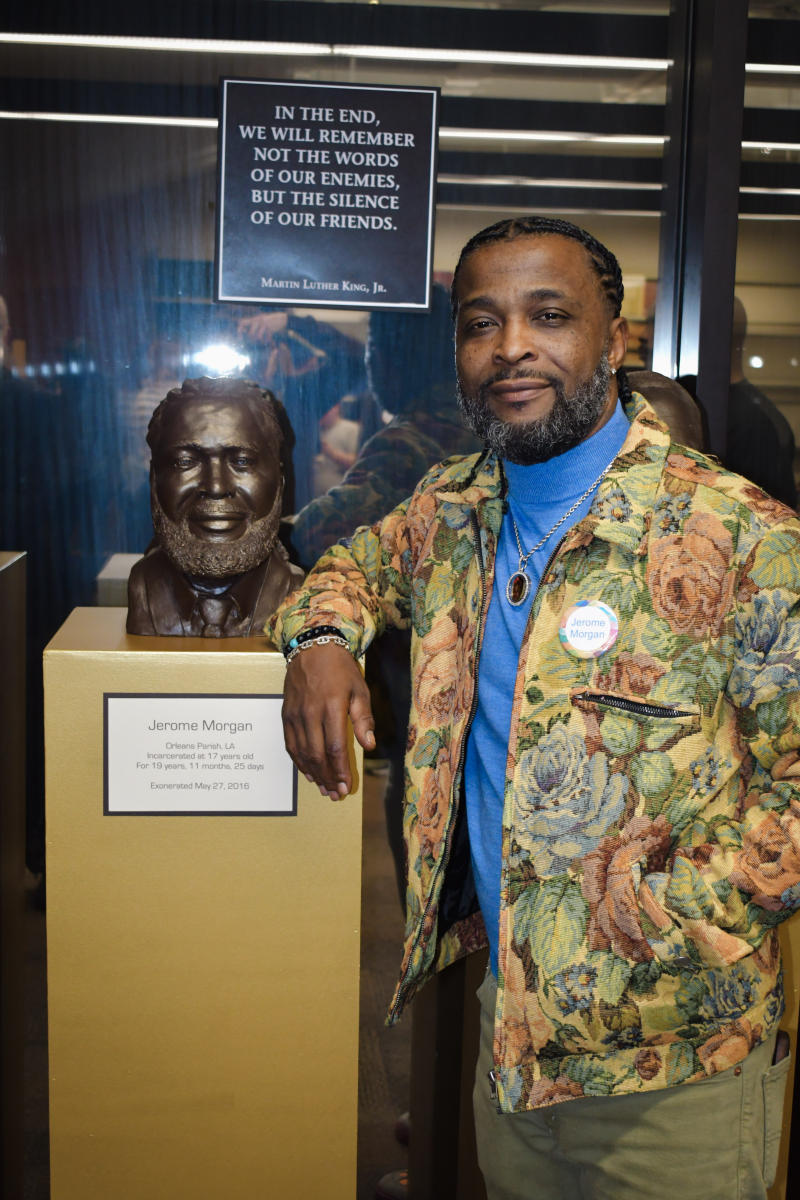 Jerome Morgan with his portrait.
