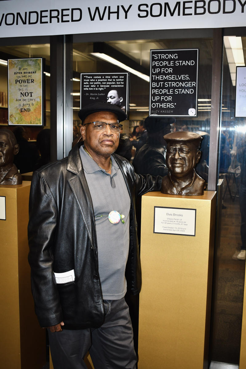 Elvis Brooks with his portrait.