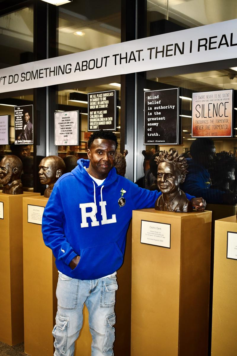 Cedric Dent, Elvis Brooks' nephew, and his portrait.
