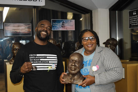 Robert and Kendra Jones with Robert's portrait off the pedestal!
