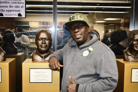 George Toca with his bust.